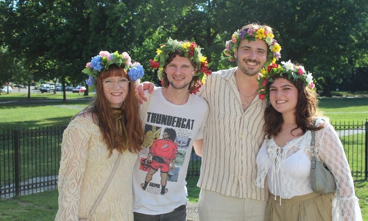 Two men and two women wear crowns of flowers at the American Swedish Historical Museum's annual Midsommarfest.