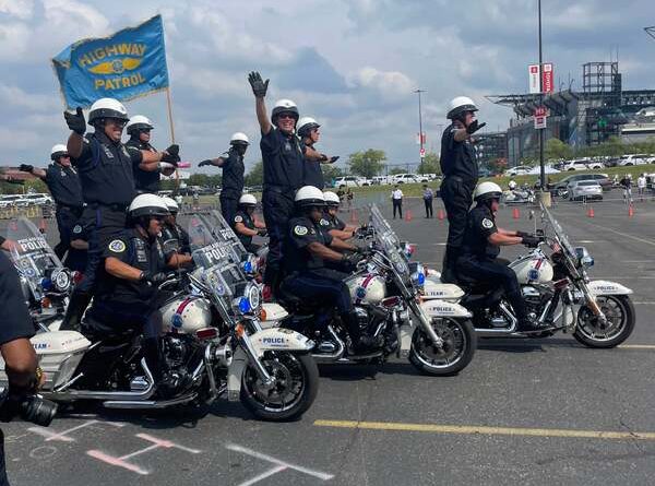 Philadelphia Hero Thrill Show. Police Officers on motorcycles perform tricks.